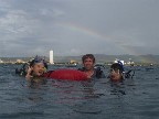 Two new OW divers coming up in time to see a rainbow over the harbor on May 4, 2004